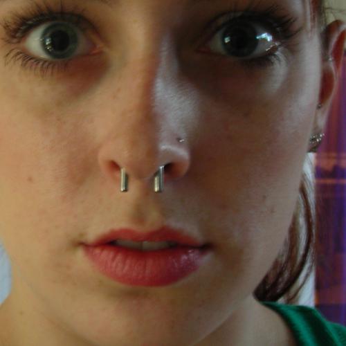 Titanium septum retainer