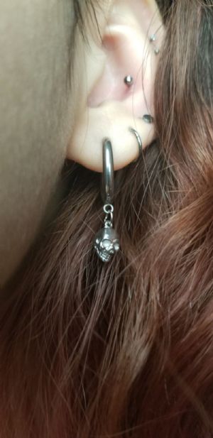 Steel Skull Dangle Huggie Earring Customer Photo