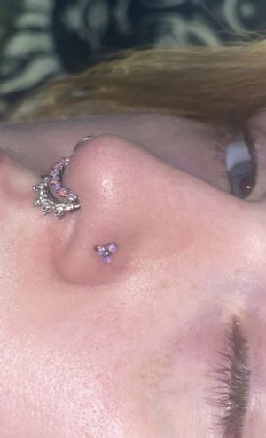 Titanium and Synthetic Opal Triad Nosescrews Customer Photo